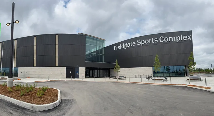 Fieldgate Sports Complex exterior entrance with the building name above the doors.